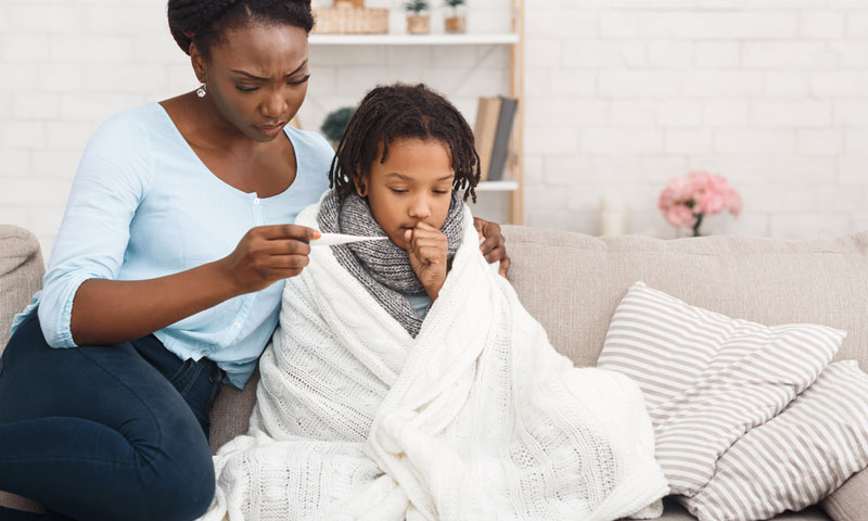 Mom taking care of sick child